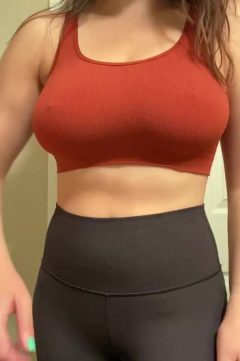 fit woman with big tits wearing sports bra