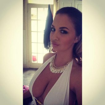 British glamour model Ellis Attard busty cleavage