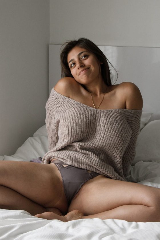 busty girl braless sweater