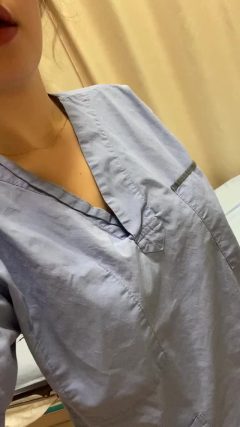 naughty nurse flashing sexy tits with big long nipples at work