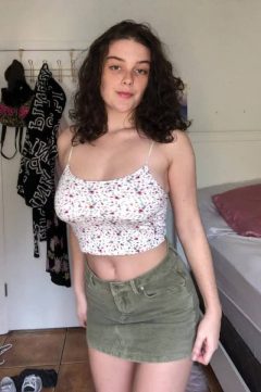 sexy young girl with big tits inj braless t-shirt and hairy pussy under mini skirt