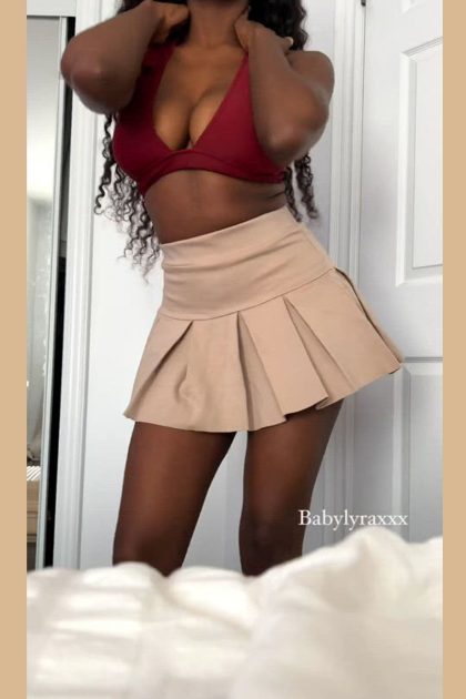 Busty ebony babe Lyra getting naked (gif)