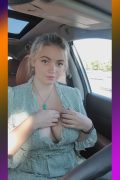 Charming amateur girl flashing big boobs inside the car