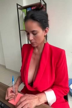 Busty MILF with sexy braless outfit in the office