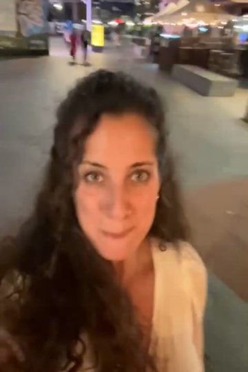 Tourist flashing boobies in public! (gif)