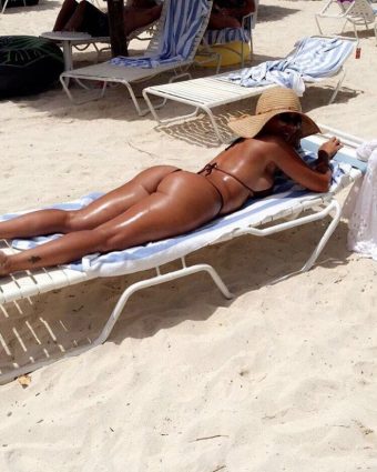 Vida Guerra sexy bikini on the beach